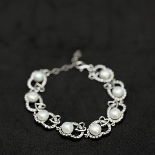 Silver Pearl Bracelet in Stone Heart